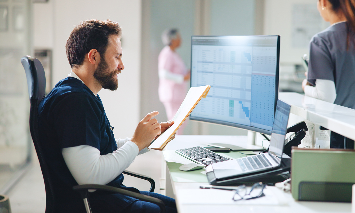 Ambulatory nurse at desk in care center