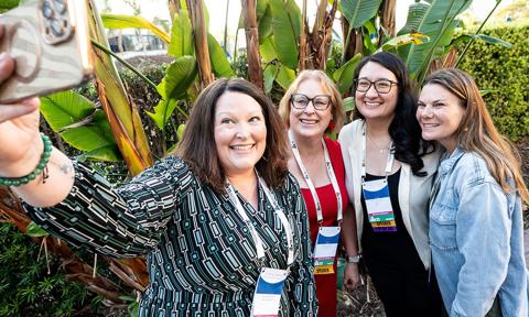 AAACN members taking a selfie at a conference