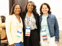 Three AAACN members smiling